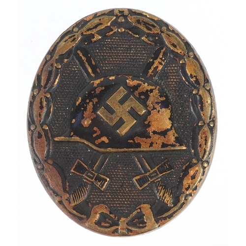 2734 - A German military interest Wound style badge.