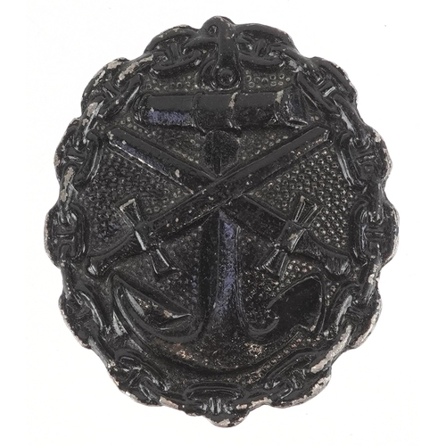2735 - A German military interest naval Wound style badge.