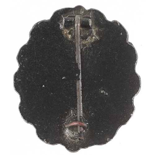 2735 - A German military interest naval Wound style badge.