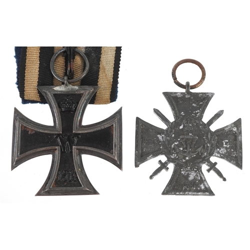 2718 - A German military interest Iron Cross and Flanders Marine Cross.