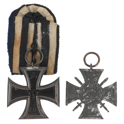 2718 - A German military interest Iron Cross and Flanders Marine Cross.