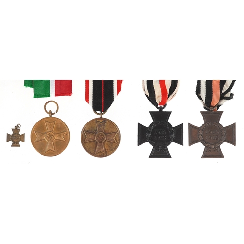 2725 - Four German military interest medals and a dress medal.