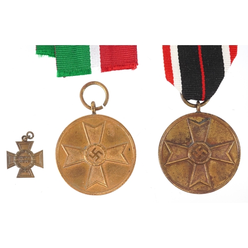 2725 - Four German military interest medals and a dress medal.