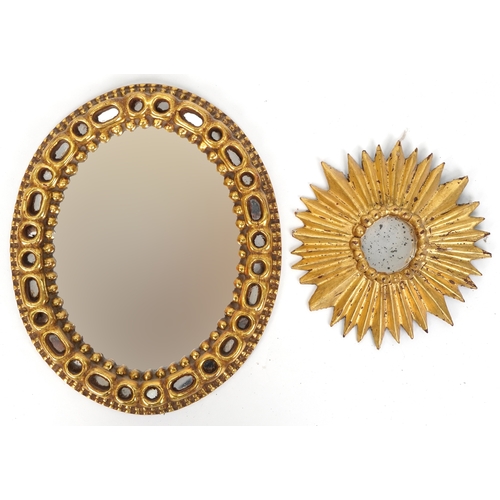 2134 - A 20th century Spanish sun mirror, 20cm in diameter together with an oval gilt framed wall mirror, 3... 