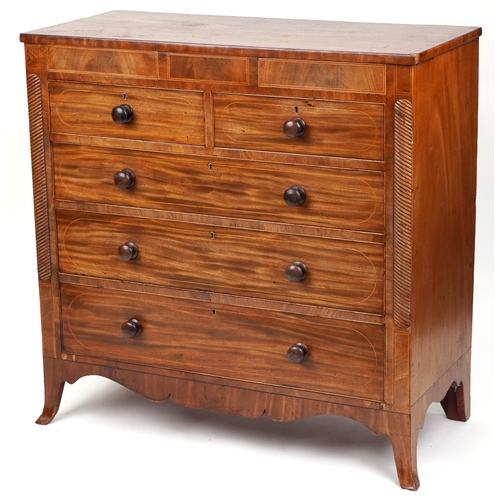 2001 - A late George III mahogany chest of two short and three long drawers raised on splayed bracket feet,... 