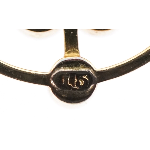 3048 - An Edwardian 15ct gold blue stone and seed pearl openwork pendant on a 9ct gold necklace, 2.4cm high... 