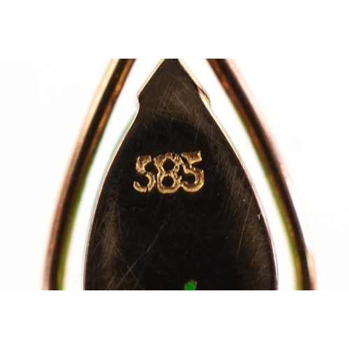 3169 - A 14ct gold green stone pendant, tests as jade, on a 14ct gold necklace, 1.4cm high and 40cm in leng... 