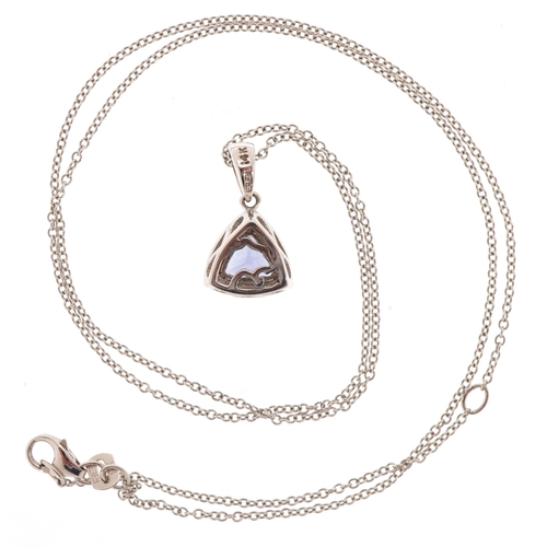 3224 - A 14K gold tanzanite and diamond cluster pendant on a 14K white gold necklace, 1.0cm high and 46cm i... 