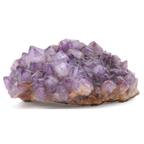 338 - A large natural amethyst crystal cluster specimen, 30cm wide.