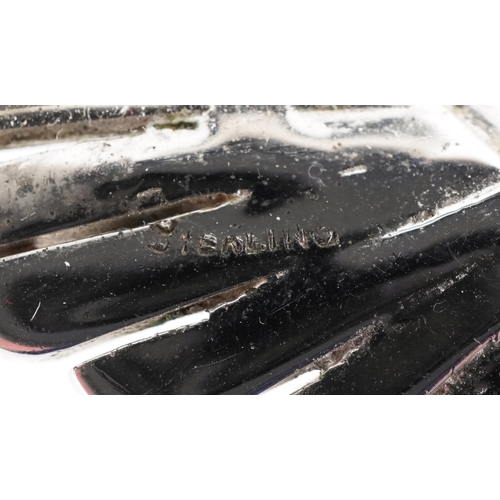 3366 - A sterling silver and clear stone brooch in the form of an Austin radiator badge, 7cm wide, 18.8g.