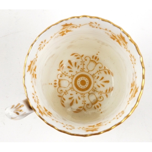 666 - A set of nine Coalport coffee cups and saucers together with a similar Coalport example, the largest... 