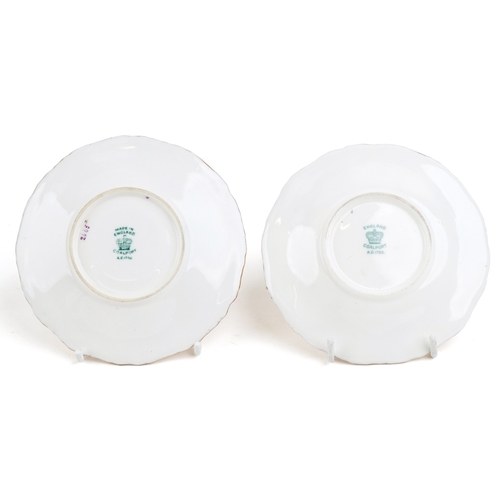 666 - A set of nine Coalport coffee cups and saucers together with a similar Coalport example, the largest... 