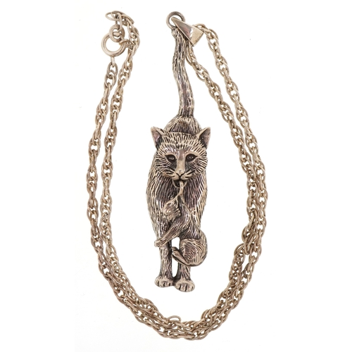 3375 - An unmarked silver articulated cat pendant on a silver necklace, 6.9cm high and 40cm in length, tota... 