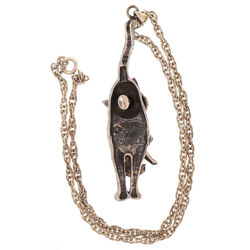 3375 - An unmarked silver articulated cat pendant on a silver necklace, 6.9cm high and 40cm in length, tota... 