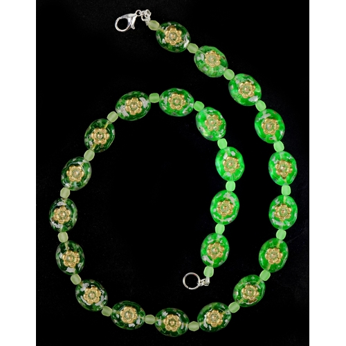3370 - A uranium glass bead necklace with floral design, 40cm in length, 30.2g.