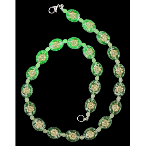 3370 - A uranium glass bead necklace with floral design, 40cm in length, 30.2g.