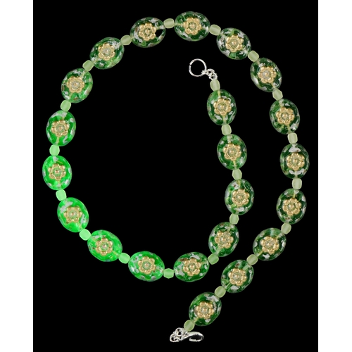 3370 - A uranium glass bead necklace with floral design, 40cm in length, 30.2g.