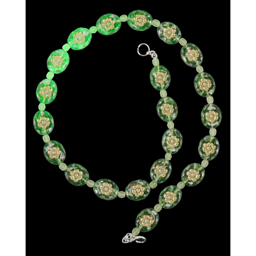 3370 - A uranium glass bead necklace with floral design, 40cm in length, 30.2g.