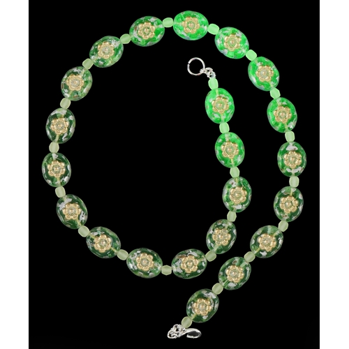 3370 - A uranium glass bead necklace with floral design, 40cm in length, 30.2g.
