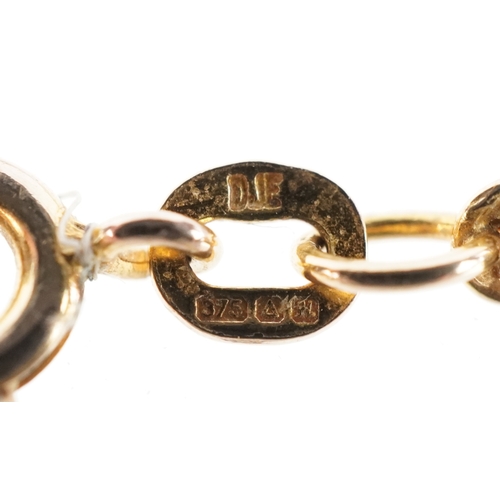 3015 - A 9ct gold koala pendant on a 9ct gold rope twist necklace, 1.9cm high and 44cm in length, total 16.... 