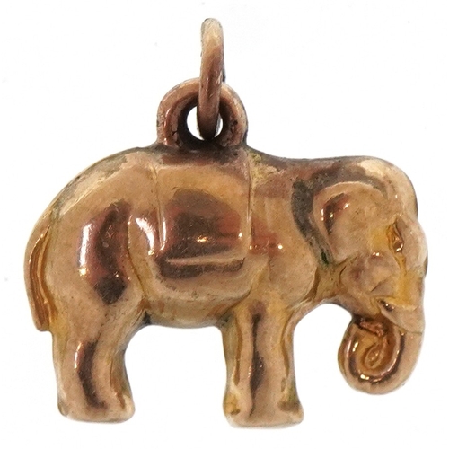 3280 - An unmarked gold charm in the form of an elephant, 1.4cm wide, 0.9g.