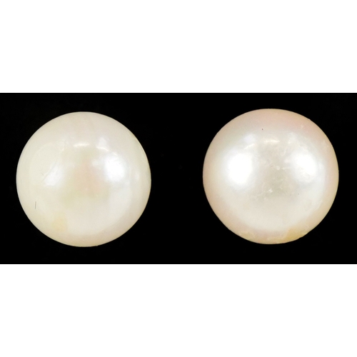 3205 - A pair of 9ct gold cultured pearl stud earrings, 6.5mm in diameter, total 1.2g.
