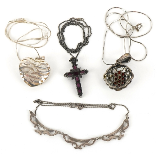 3359 - Four silver necklaces including an amethyst cross pendant and a garnet and marcasite cluster pendant... 