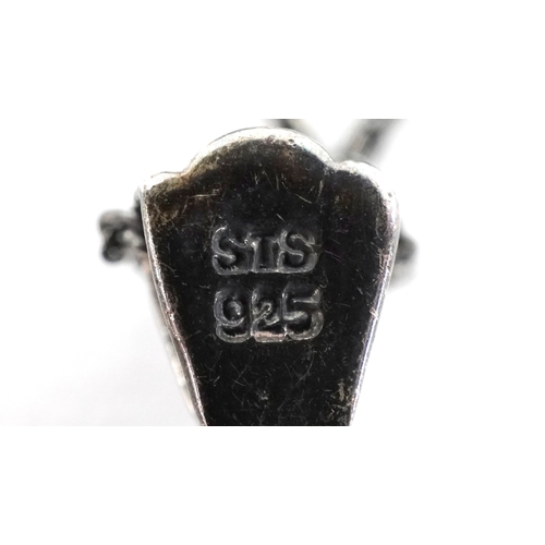 3359 - Four silver necklaces including an amethyst cross pendant and a garnet and marcasite cluster pendant... 