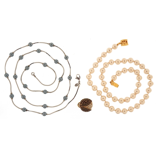 3524 - Vintage Monet designer jewellery comprising two simulated pearl necklaces and a ladybird brooch, the... 