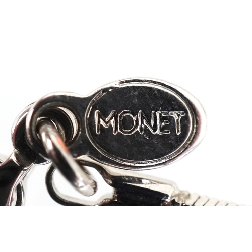 3524 - Vintage Monet designer jewellery comprising two simulated pearl necklaces and a ladybird brooch, the... 