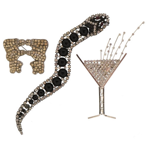 3556 - Butler & Wilson brooches including a cocktail and a serpent, the largest 17cm in length, total 62.9g... 
