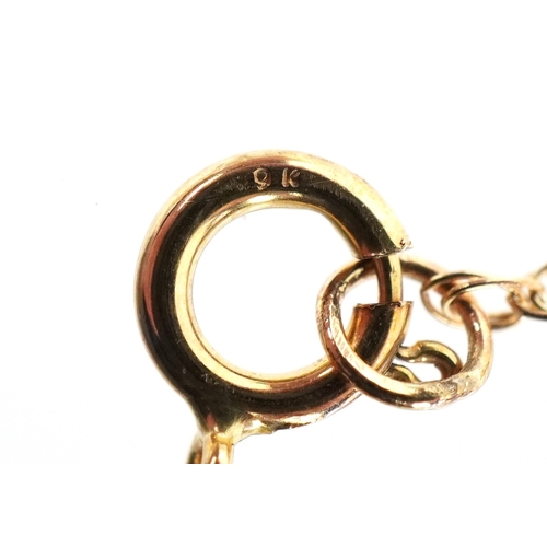 3144 - A 9ct gold Mizpah pendant on a 9K gold necklace, 1.6cm in diameter and 50cm in length, total 2.1g.