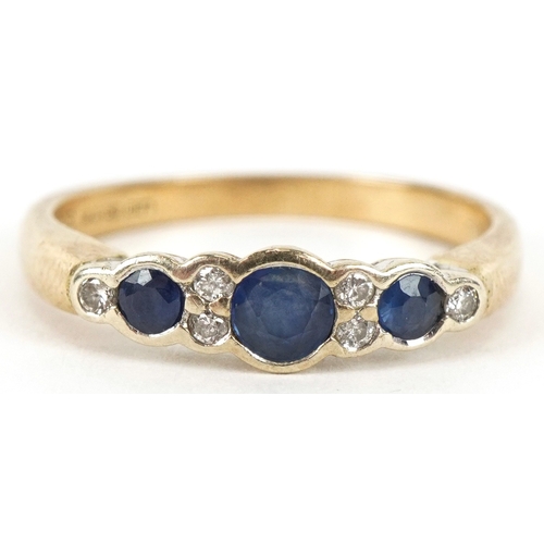 3110 - A 9ct gold graduated sapphire and diamond half eternity ring, size M, 2.4g.