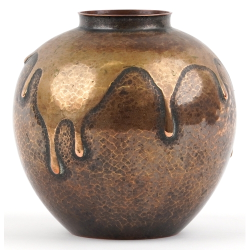 460 - A Japanese copper vase with planished decoration character marks to the base, 18cm high.