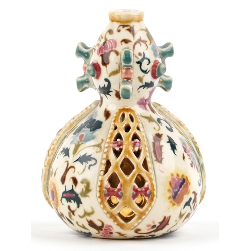 489 - Zsolnay Pécs, A Hungarian porcelain reticulated vase hand painted with stylized flowers, 15cm high.