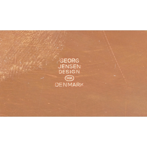 1786 - Antique metalware including a brass trivet, copper warming pans and jelly moulds, the largest 40cm i... 