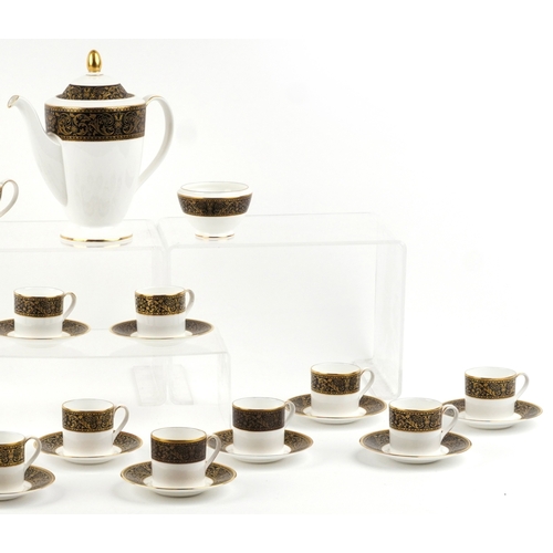 658 - A Minton Grandee pattern twelve place coffee service, the coffee pot 23cm high.
