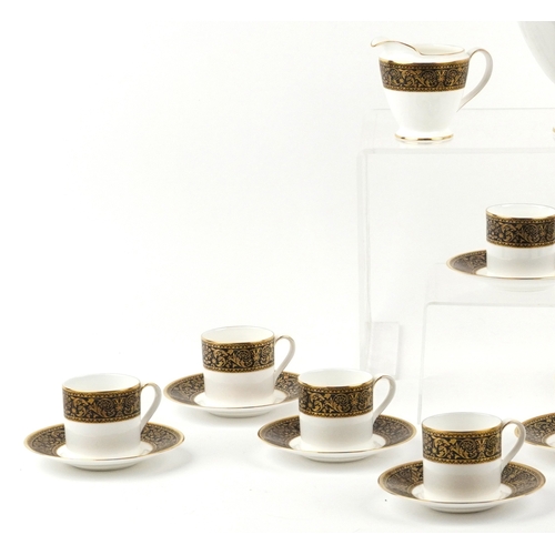 658 - A Minton Grandee pattern twelve place coffee service, the coffee pot 23cm high.