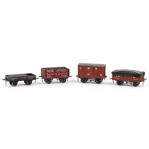 733 - Four vintage scratch built O gauge model railway wagons, the largest 12cm in length.