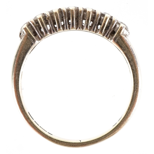 3053 - A 9ct gold diamond half eternity ring, total diamond weight approximately 0.25 carat, size G, 1.7g.