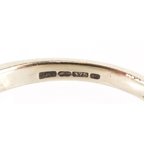 3053 - A 9ct gold diamond half eternity ring, total diamond weight approximately 0.25 carat, size G, 1.7g.