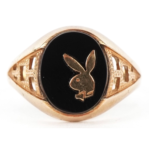 3034 - A 9ct gold onyx Playboy Bunny signet ring, size R/S, 3.2g.