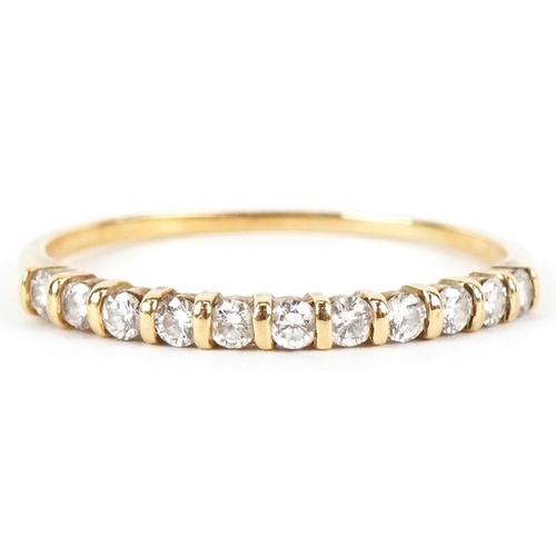 3102 - An 18ct gold diamond half eternity ring, size T, 1.7g.