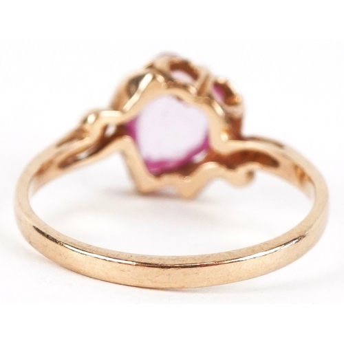 3344 - A 9ct gold pink topaz love heart design ring, size L/M, 1.9g.