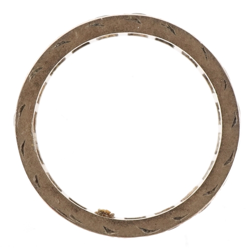 3295 - An unmarked white gold clear stone eternity ring, size N, 3.5g.