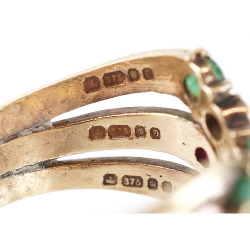 3029 - A 9ct gold multi gem triple wishbone ring set with diamonds, rubies, emeralds and spinel, size Q, 6.... 