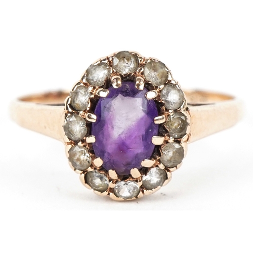 3226 - A 9ct gold amethyst and clear stone cluster ring, size Q/R, 2.1g.