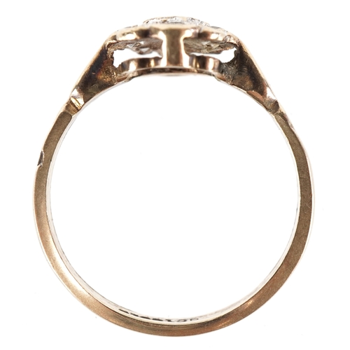 3084 - A 9ct gold clear stone flower head ring, size L, 1.8g.