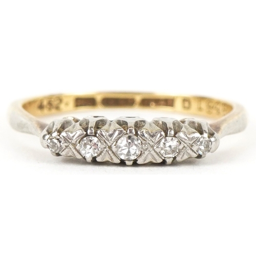3334 - An 18ct gold and platinum graduated diamond five stone ring, size L, 2.5g.