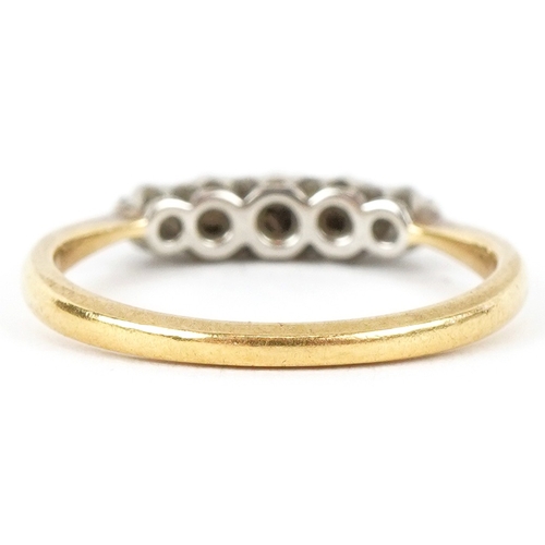 3334 - An 18ct gold and platinum graduated diamond five stone ring, size L, 2.5g.